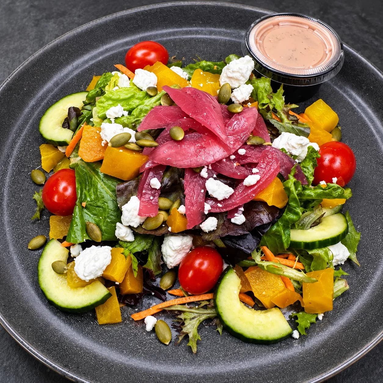 Farmer Market Salad — with golden beets, veggies, goat cheese, pickled onion and pomegranate vinaigrette